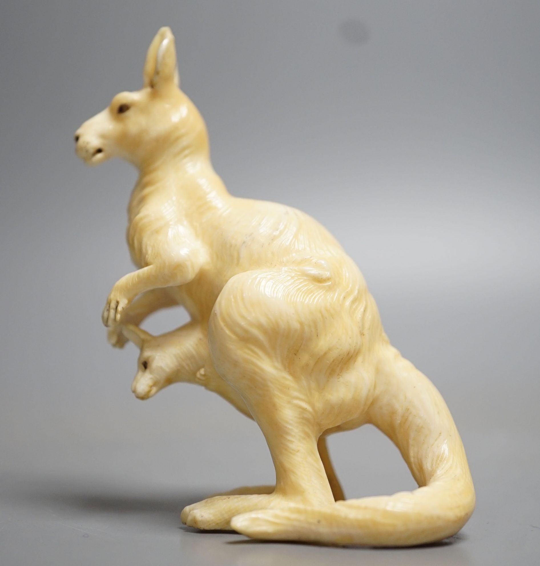 An unusual Japanese ivory okimono of a kangaroo with a Joey in its pouch, Meiji period. 8cm tall